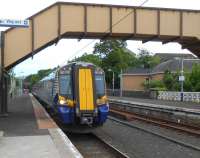 380 018 arrives at Largs on 20 June 2013 with the 14.48 ex-Glasgow Central. It will form the 15.53 Largs - Glasgow Central return service.<br>
<br><br>[Brian Smith 20/06/2013]