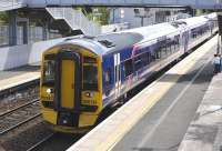 Sparkling 158721 and a 170 unit enter Inverkeithing with the 13.57 Edinburgh - Inverness train on 30 June.<br><br>[Bill Roberton 30/06/2013]