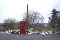 The location given inside this telephone kiosk was 'Halstead Railway Station'. The kiosk stood close to the front entrance of the station, but by 12th February 1978, only the entrance steps (to the left of the kiosk) remained. The steps were a poignant memorial to over a century's worth of rail travelers that had made use of them, the last in December 1961. Time was eventually called on the kiosk and steps too and a block of flats now occupies this site.<br><br>[Mark Dufton 12/02/1978]