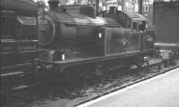 Stratford shed's N7 0-6-2T no 69671 stands at the buffer stops at Liverpool Street station in 1961.<br><br>[K A Gray 08/10/1961]