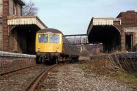 A DMU on layover at Sudbury before returning to Colchester in March 1978. Sudbury became the terminus when the line west through Haverhill to Cambridge was closed in March 1967. Survival of the through route was not helped by BR timetablers in the 1960s, who treated the small market town of Sudbury as a service terminus for trains to the east and west. Peak hours apart, if you wanted to travel through Sudbury, you were often faced with a long wait there for a connection. <br><br>[Mark Dufton 11/03/1978]