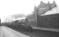 The 5.30 pm Glasgow Buchanan Street - Aberdeen train runs into Stirling station on a wet evening in May 1964 behind A4 Pacific no 60009 <I>Union of South Africa</I>. <br><br>[K A Gray 18/05/1964]