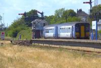 A 2-car DMU departing Lowestoft for Ipswich in the summer of 2011.<br><br>[Ian Dinmore 02/07/2011]