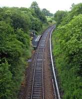 View over Sugar Loaf Halt on the Heart of Wales Line in June 2008, seen from the farm accommodation bridge just to the Llandovery side of the station looking north towards Builth Road. The elevated position gives a good impression of the modest facilities. [See image 38708] <br><br>[Bill Jamieson 21/06/2008]