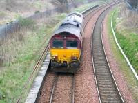 EWS 66008 runs east along the 'sub' in March 2007 heading for Millerhill yard. The locomotive is passing the remains of Duddingston station.<br><br>[John Furnevel 28/03/2007]