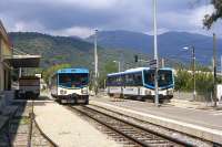 The Chemins de Fer de Provence is a 151 km long metre gauge line connecting Nice with Dignes-les-Bains in the department of Alpes-de-Haute-Provence. The photograph was taken at Lingostiere in the northern suburbs in September 2004 and shows two of the line's railcars - the slightly more modern one on the right is X305, which was built in 1977.<br><br>[Bill Jamieson 01/09/2004]