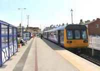 142084, newly arrived from Darlington, stands at Saltburn terminus on 6 June prior to retracing its route and then continuing on to Bishop Auckland.<br><br>[Mark Bartlett 06/06/2013]