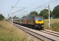 Travelling from Dundee to Chester, as part of a UK tour, the <I>Royal Scotsman</I> passed through Lancashire on 7th July 2013. The luxury coach set must have its own auxiliary power unit as the train was top and tailed by non-ETS West Coast locos, namely 47237 seen here leading the train south of Woodacre, and 57009 on the rear. <br><br>[Mark Bartlett 07/07/2013]