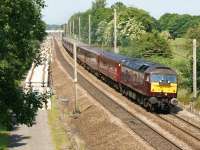 On the annual UK tour, 47237 heads the <I>Royal Scotsman</I> on Day 1 with the Dundee to Chester part of the trip south from Balshaw Lane Junction.<br><br>[John McIntyre 06/07/2013]