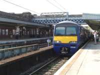 Former ScotRail 322481 boards at Wakefield Westgate on 9 July before departure at 16.33 on the all stations service to Doncaster. The Class 322 fleet has never had Northern Rail livery applied, possibly due to a short lease term.<br><br>[David Pesterfield 09/07/2013]