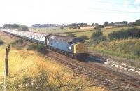 Memories of another long hot summer. 40097 is eastbound from Blackpool North on 28 August 1982 with a returning Summer Saturdays only train that has just passed through Kirkham and Wesham. [See image 20389] showing the locomotive heading for Blackpool earlier in the day.  <br><br>[Mark Bartlett 28/08/1982]