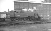 BR Standard Class 2 2-6-2T 84024 alongside Stewarts Lane shed in August 1961.<br><br>[K A Gray 21/08/1961]