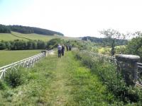 The bridge over the Lyne Water on the approach to Lyne station in July 2013. View is east, back towards Peebles. [See image 43800]<br><br>[John Yellowlees 08/07/2013]