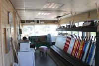 Interior of the closed Bare Lane signal box on 16 July 2013. The structure was scheduled for demolition granted a stay of execution while it was used by temporary platform staff until electronic passenger displays were installed at Bare Lane station. The lever frame dated from 1937 but most of the other equipment and instruments were removed. The box was finally demolished in January 2014.<br><br>[Mark Bartlett 16/07/2013]
