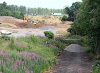 Ongoing work in connection with the Borders Railway project taking place to the south of the Edinburgh City bypass. Scene on 18 July 2013 with road traffic passing in the background. <br><br>[John Furnevel 18/07/2013]