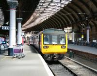 Platform 1 at York, the sole remaining bay in the south east corner of the station, used primarily for services on the Hull line. Northern 142090 occupies the platform shortly after noon on 4 June, having arrived as the 11.40 ex-Selby. It will depart as the 12.47 service to Hull.  <br><br>[John Furnevel 04/06/2013]