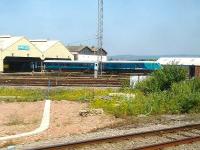 The DVT end of the coaching stock from the Welsh Assembly funded North Wales to South Wales express service stands outside Canton depot following arrival from Holyhead on 17 July. The nose of a standby class 67 loco can be seen on the left just inside the shed.<br><br>[David Pesterfield 17/07/2013]