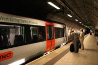 Platform scene at Heathrow Terminal 1 on 19 January 2006, with a <I>Heathrow Connect</I> stopping service to Paddington pulling in.<br><br>[John Furnevel 19/01/2006]