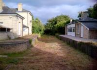 The platform side view of Linton station is possibly more impressive than the road side view [see image 43875]. The station would seem to be easy to reopen - apart from the office block built across the trackbed behind the photographer.<br><br>[Ken Strachan 20/07/2013]