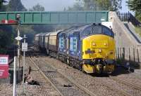 DRS 37425+37423, with 37409 on the tail, roar through Dunblane on 21 July with a <I>Northern Belle</I> empty stock movement from Aberdeen to Crewe.<br><br>[Bill Roberton 21/07/2013]