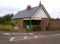 The former wayside station at Barnwell is now adjacent to the Oundle bypass, which is built on the trackbed. I have driven past the station maybe six times without noticing its presence - I must have been concentrating on driving! The bench in the porch carries the lettering: GWR FARES.<br><br>[Ken Strachan 21/07/2013]