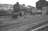 Class O2 2-8-0 no 63972 stands in the yard of the former GC shed at Retford (Thrumpton), thought to be in the early 1960s. The locomotive was withdrawn from here in May 1963 with the shed itself closing two years later.<br><br>[K A Gray //]