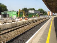 The new platform 8 under construction on south side of Cardiff Central, showing some of the pre cast sections that are used to form the platform rear support wall plus the tubular piles needed to support the platform superstructure. <br><br>[David Pesterfield 17/07/2013]