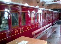 Something shiny in the goods shed at the East Anglian Railway Museum - two four-wheeled vehicles, being a GE First Class coach and a luggage/guards van respectively.<br><br>[Ken Strachan 20/07/2013]