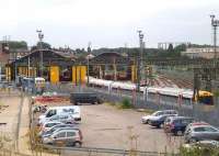 General view south east over Willesden depot on 20 July from the high level platforms at Willesden Junction.<br><br>[John Thorn 20/07/2013]