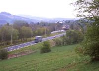 The A6091 and Melrose station seen on 8th May 2013, with the road occupying most (but not all) of the old railway solum. For the same view taken by the photographer's father 48 years earlier [see image 43900].<br><br>[David Spaven 08/05/2013]