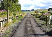 View south through the former Heriot station from the level crossing on 25 July 2013. <br><br>[Bill Roberton 25/07/2013]