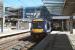The changing face of Haymarket. View west on 17 May 2013 as the East Coast 09.52 Aberdeen - London Kings Cross HST runs into platform 1. <br><br>[John Furnevel /05/2013]