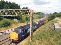 37603+20312 climb away from Farington Curve Jct on 27 July with a Compass Railtour from Blackpool. The tour of Lancashire and West Yorkshire included the Copy Pit climb from Burnley. Reports indicate that the train came to a stand on the climb and the assistance of 47805 on the rear was required.<br><br>[John McIntyre 27/07/2013]