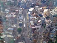 View west over Metropolitan Junction from The Shard on 20 July. Trains are passing on the lines running to Waterloo East and Charing Cross, while turning off to the right are the lines to Blackfriars Junction. Also heading for Blackfriars Junction are the lines from Elephant & Castle on the LCDR route - seen crossing the L&G formation in the centre background. The combined route will then cross the Thames on Blackfrars Bridge just off picture top right.<br><br>[John Thorn 20/07/2013]