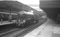 4472 <I>Flying Scotsman</I> photographed in Aberdeen station on 16 May 1964 after bringing in the <I>Queen's College Railway & Transport Society Flying Scotsman Rail Tour</I>. The special had arrived earlier from Edinburgh Waverley, having run via Glenfarg and Forfar.<br><br>[K A Gray 16/05/1964]