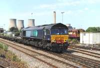 Direct Rail Services 66418 approaching Didcot eastbound on 1 August with a train of empty container flats.<br><br>[Peter Todd 01/08/2013]