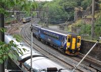 156432 runs through Princes Street Gardens with a Glasgow Central service on 1 August as two 170s are about to pass.<br><br>[Bill Roberton 01/08/2013]