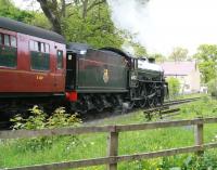 B1 4-6-0 no 61002 <I>Impala</I> (aka 61264) picks up after the token exchange at New Bridge level crossing on 1 June with the 11.30 NYMR service from Grosmont to Pickering.<br><br>[John Furnevel 01/06/2013]