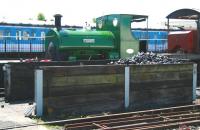 Diminutive 0-4-0ST <I>Teddy</I> in the yard at the NRM in June 2013. Built in Bristol by Peckett & Sons in 1942 (works no 2012) <I>Teddy</I> is believed to be the smallest working standard gauge steam locomotive in the UK. Originally used by the Royal Ordnance Corps in Poole, Dorset, the locomotive spent much of its life, including the war years, shunting wagons around the very tight yard there. <I>Teddy</I> is now regularly employed on mini tourist steam trips at the NRM.    <br><br>[John Furnevel 06/06/2013]