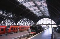 Platform 24 at Leipzig Hauptbahnhof, seen here on 6th July 2013, hosts a former Deutsche Reichsbahn 2-10-0 steam loco (used occasionally on excursions) and an assortment of preserved diesel and electric rolling stock. Built between 1909 and 1915, this was the largest terminus station in Europe when opened, with 26 platforms - only two of which have been lost (to car parking).<br><br>[David Spaven 06/07/2013]