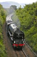 A1 Pacific no 60163 <I>Tornado</I> at the head of the SRPS Fife Circle railtour on 16 June 2013. The train is passing Clackmannan, with vegetation starting to encroach on the relaid line.<br>
 <br>
 <br>
<br>
 <br><br>[Bill Roberton 16/06/2013]