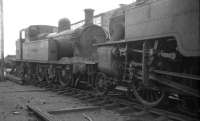 Former Sligo, Leitrim and Northern Counties Railway 0-6-4T No 26 <I>Lough Melvin</I> in a siding at Belfast York Road shed in the summer of 1965, the year of its withdrawal.<br><br>[K A Gray 26/08/1965]