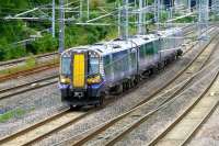 380115 passing the site of the former Paisley Goods signal box on the up Ayr line on 24 June 2013. [See image 19863]<br><br>[Colin Miller 24/06/2013]