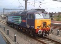 DRS 57302 <I>Chad Varah</I> awaits its next turn of duty in the South end bays at Rugby station on a hazy Thursday evening.<br><br>[Ken Strachan 08/08/2013]