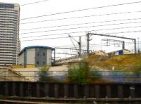 A chance in how many million of ending with a shot of two crossing Eurostar sets in the right place together on the approach to St. Pancras when only one was initially seen from the 07.00 ex Leeds East Coast service running down into Kings Cross.<br><br>[David Pesterfield 09/08/2013]