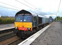 The 10.39 (SO) Grangemouth WHM - Daventry passing Coatbridge Central on 10 August behind DRS 66422.<br><br>[Veronica Clibbery 10/08/2013]