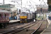 Royal Scot 46115 <I>Scots Guardsman</I> and Brush Type 4 47760 at Carlisle platform 3 on 11 August having brought in <I>The Waverley</I> from York. The special ran out and back via the Settle & Carlisle route. <br><br>[Bruce McCartney 11/08/2013]