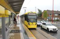 The new, 3.9 mile line to Droylsden opened in February 2013 and involves mainly street running into Manchester but also reserved track around the Velopark and football stadium. Droylsden is a temporary terminus as a 2 mile extension to Ashton-under-Lyne will be opening in winter 2013/14. Tram 3036 has crossed to the Manchester line at the turnback siding and runs into the platform to form a service back to the city centre. <br><br>[Mark Bartlett 31/07/2013]