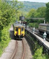 The 10.38 Middlesbrough - Whitby Northern DMU service, photographed shortly after leaving Grosmont platform 1 via the Esk Valley Line on 6 June 2013. The NYMR platforms stand on the right beyond the fence.<br><br>[John Furnevel 06/06/2013]