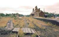 The old station at Louth, Lincolnshire, in 1977. View is south with the site of the former locomotive shed on the left and the goods yard over to the right. Closed to passengers in October 1970 the line remained open to goods traffic (grain to ABM) until the end of 1980. [See image 29248] The station site is now mainly occupied by housing, with the listed 1848 station building having been converted to flats.<br><br>[Ian Dinmore //1977]